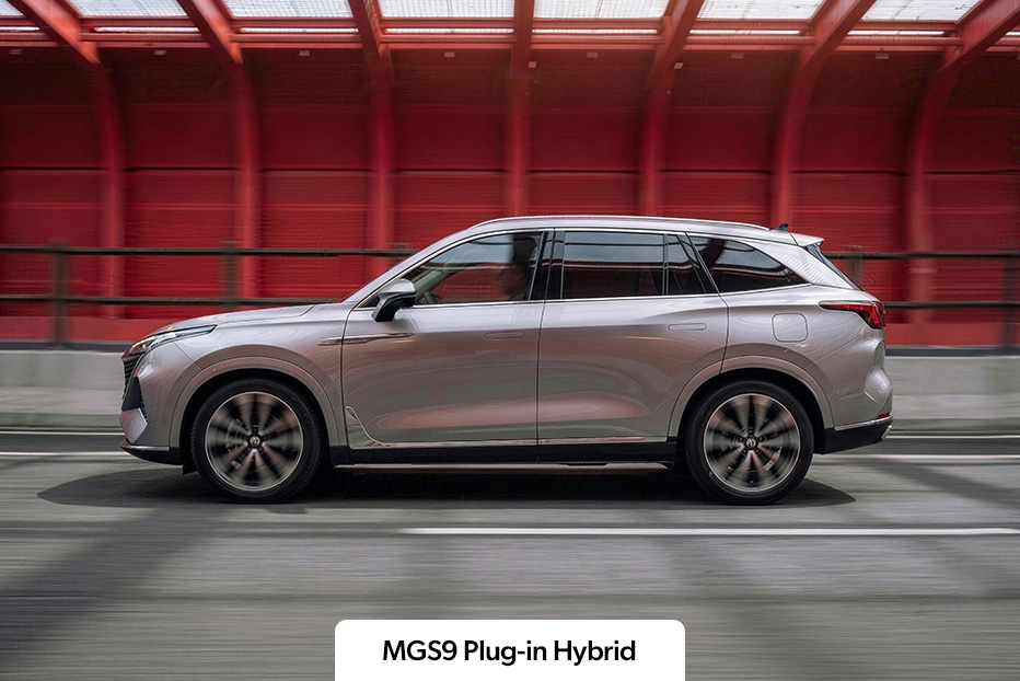 A silver MGS9 Plug-in Hybrid driving on the road