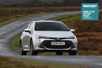 Toyota Corolla front quarter with What Car? logo