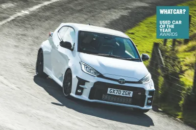 White Toyota GR Yaris front quarter with What Car? logo
